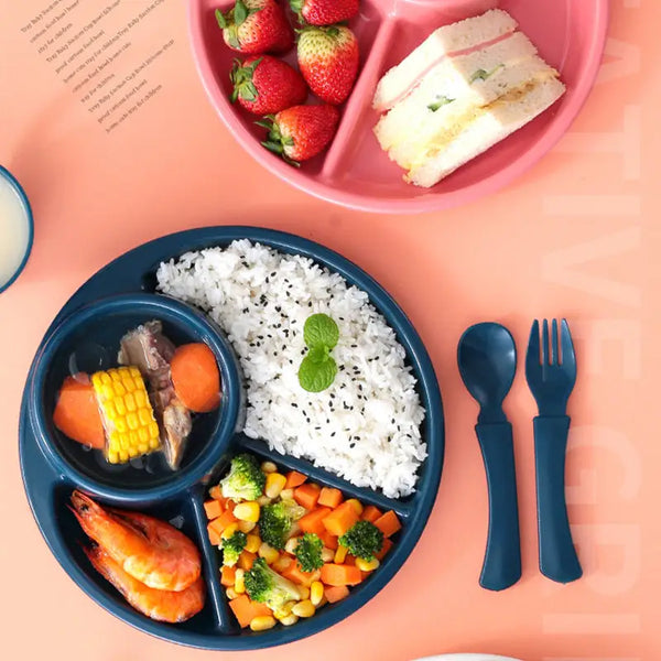 Navy blue 4 compartment plastic dinner plate with rice shrimp veggies and matching spoon fork for kids