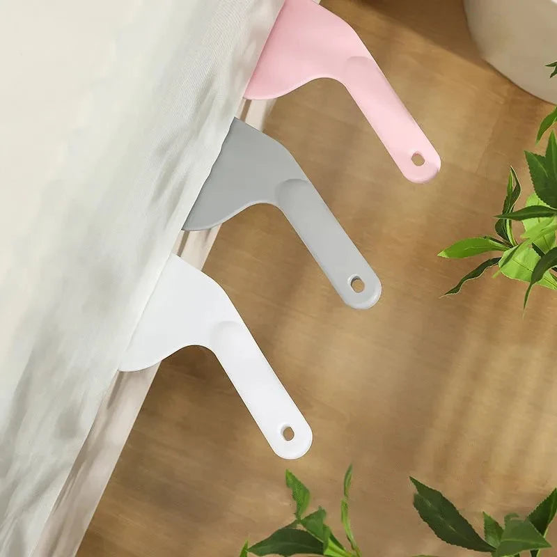 Set of pink, gray, and white bed sheet tucker tool for neatly tucking bedsheets under mattress