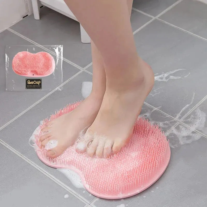 Clarify.pk silicone foot scrubber pad in pink with textured bristles for cleaning and exfoliating feet