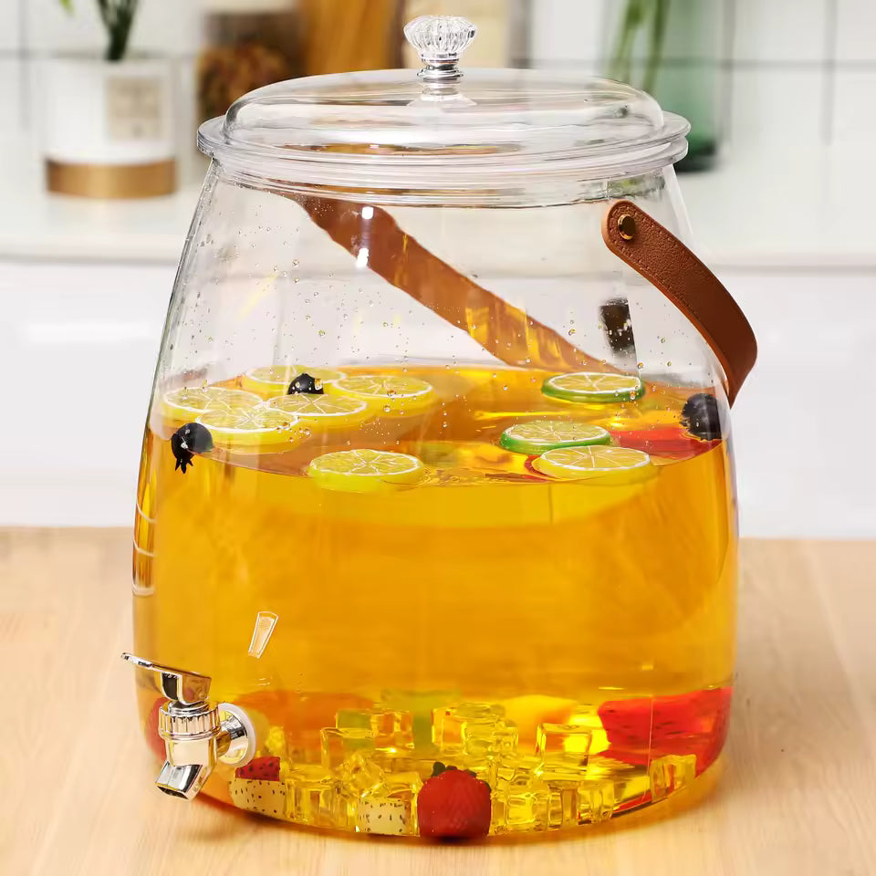 5.2L beverage dispenser with spigot filled with fruit-infused drink and ice cubes on kitchen counter