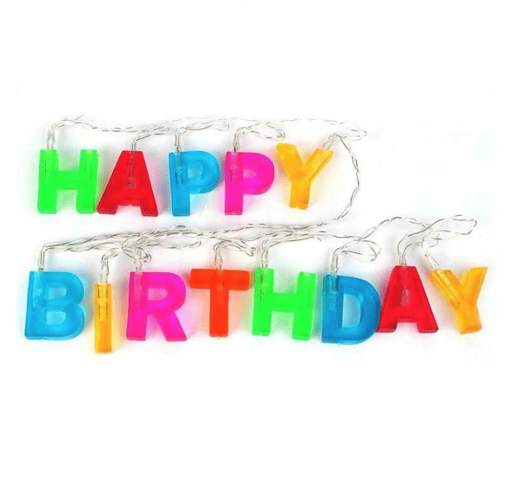 Colorful birthday decoration string lights spelling HAPPY BIRTHDAY with vibrant plastic letters