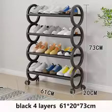 Clarify.pk black 4 layer shoe rack with rollers holding multiple shoes in a compact space