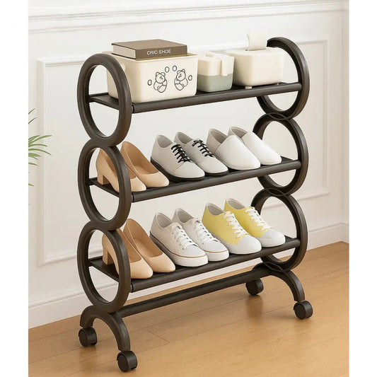 Clarify.pk 4 layer shoe rack with rollers in black holding various shoes and storage boxes