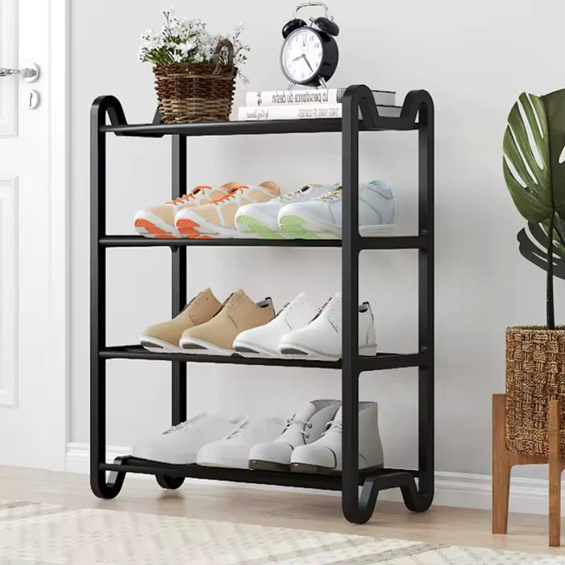 Clarify pk black metal 4 layer shoe rack with multiple shoes and decorative items on top