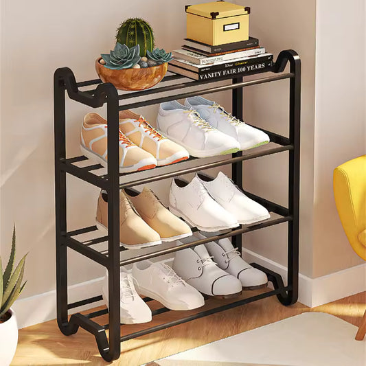 Clarify.pk black 4 layer shoe rack holding multiple pairs of shoes and decorative items