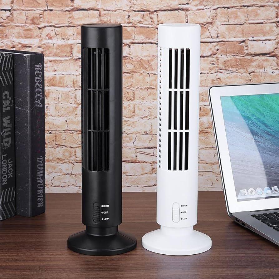 Black and white bladeless desktop tower fan models placed on a wooden desk next to books and a laptop
