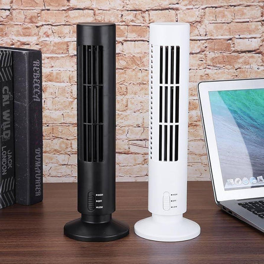Black and white bladeless desktop tower fan models placed on a wooden desk next to books and a laptop