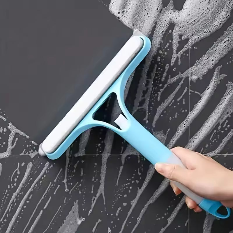 Blue and white 3-in-1 shower scraper cleaning soapy bathroom glass surface
