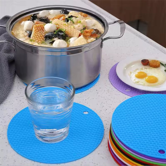 Clarify.pk silicone heat resistant mat in blue and purple protecting kitchen counter from hot pot and plate