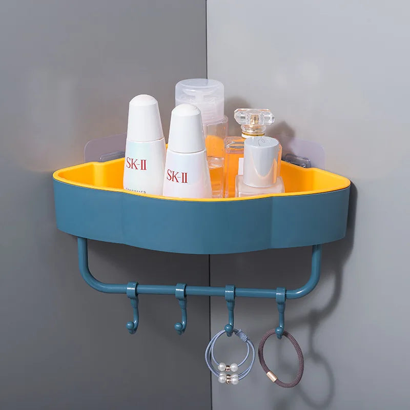 Clarify.pk wall-mounted corner shower shelf in blue and yellow holding toiletries with hooks for hanging accessories