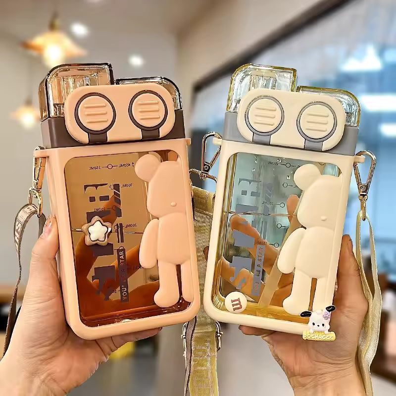 Cartoon bear water bottle set with silicone bear design and strap, available in peach and cream colors