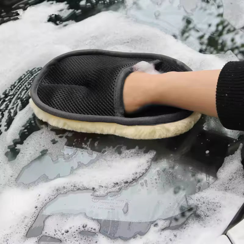 Clarify.pk black car washing gloves used for cleaning a soapy car surface effectively
