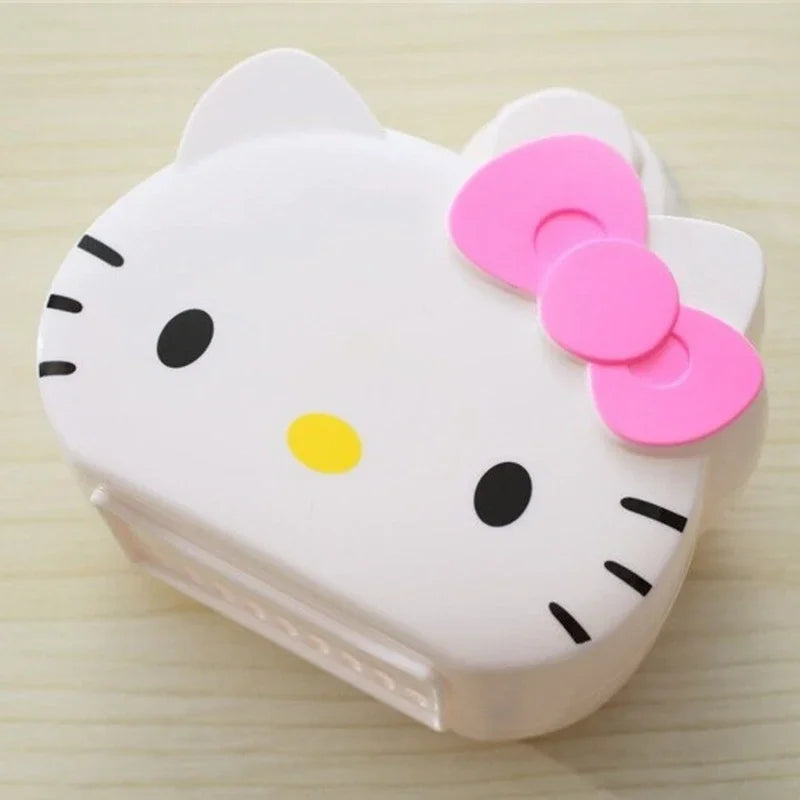 Cartoon bathroom organizer wall mount shaped like a white cat face with a pink bow