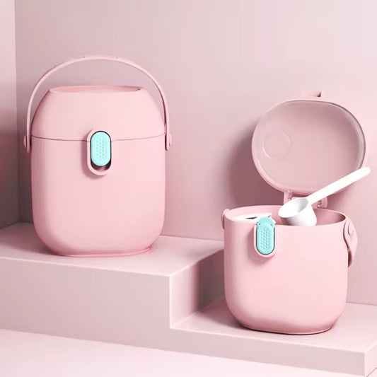 Pink cartoon infant milk powder container with secure latch and scoop by Clarify.pk