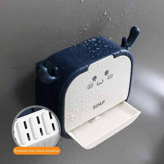 Cartoon soap holder wall mounted in blue and white with cute face design and breathable drain holes