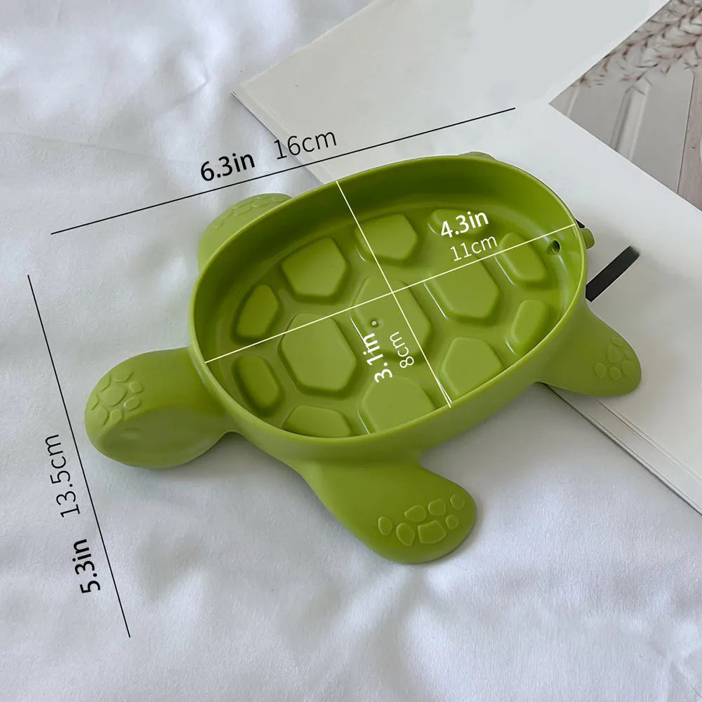 Green cartoon turtle soap holder with detailed shell design and size measurements