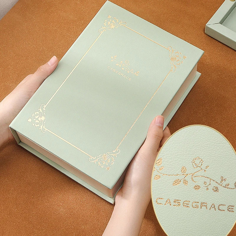 Clarify.pk PU leather necklace and bracelet case in light green with gold embossed floral design