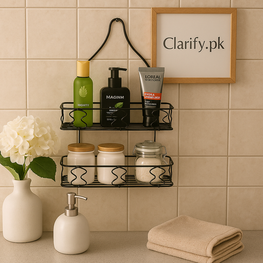 Clarify.pk black metal double layer bathroom rack mounted on tiled wall holding toiletries