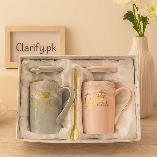 Clarify.pk couple ceramic mugs set with King and Queen gold lettering and matching lids in a gift box