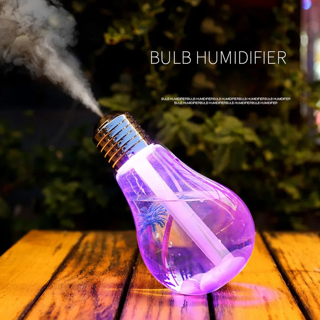 Colorful bulb humidifier by Clarify.pk emitting mist on wooden surface with purple light
