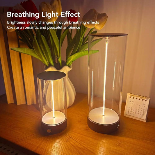 Cordless rechargeable table lamp with breathing light effect on wooden table near flowers and calendar
