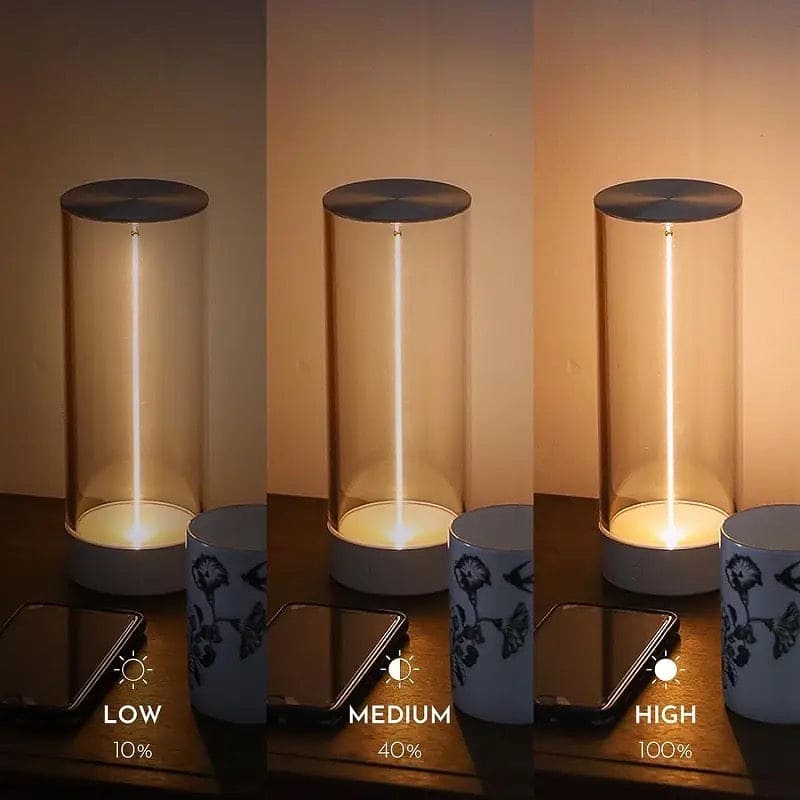 Cordless rechargeable table lamp with adjustable brightness levels low medium and high on wooden surface