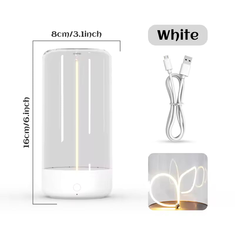 White cordless rechargeable table lamp with USB charging cable and modern lighting design
