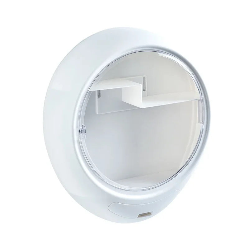 White round cosmetic storage box with clear front cover and internal shelves for organizing beauty products