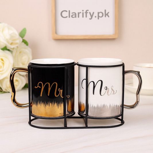 Black and white couple coffee mugs with stand featuring Mr and Mrs gold and silver lettering