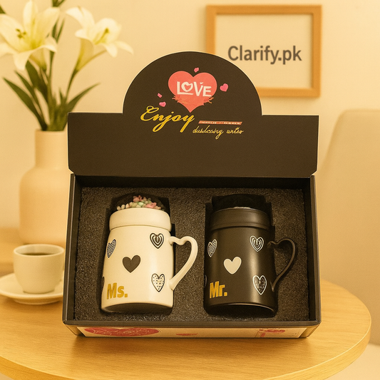 Clarify.pk couple mugs gift set with black Mr. mug and white Ms. mug with heart designs in a black box