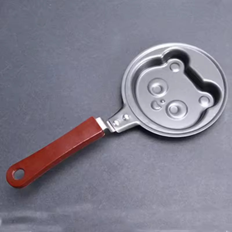 Creative cartoon mini omelette pan with bear face design and wooden handle by Clarify.pk