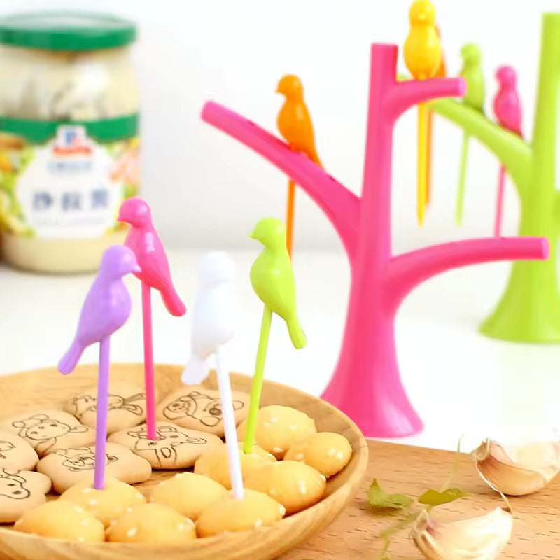 Clarify.pk creative fruit forks set with colorful bird design on wooden plate and tree stand