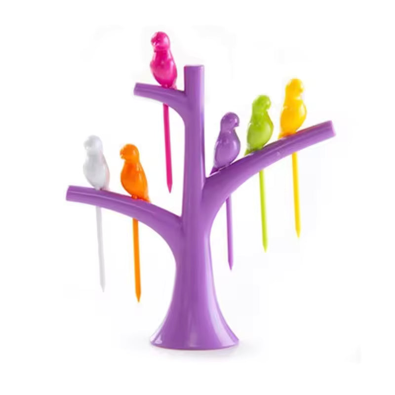Clarify.pk creative fruit forks set with colorful bird-shaped handles on a purple tree stand