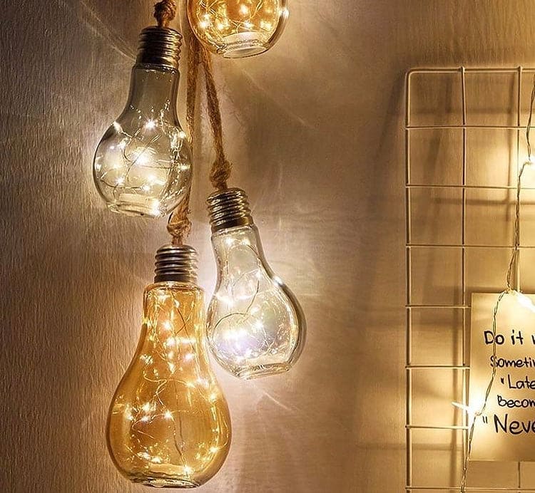 Creative hemp rope LED bulb hanging lights with warm glowing fairy lights inside glass bulbs