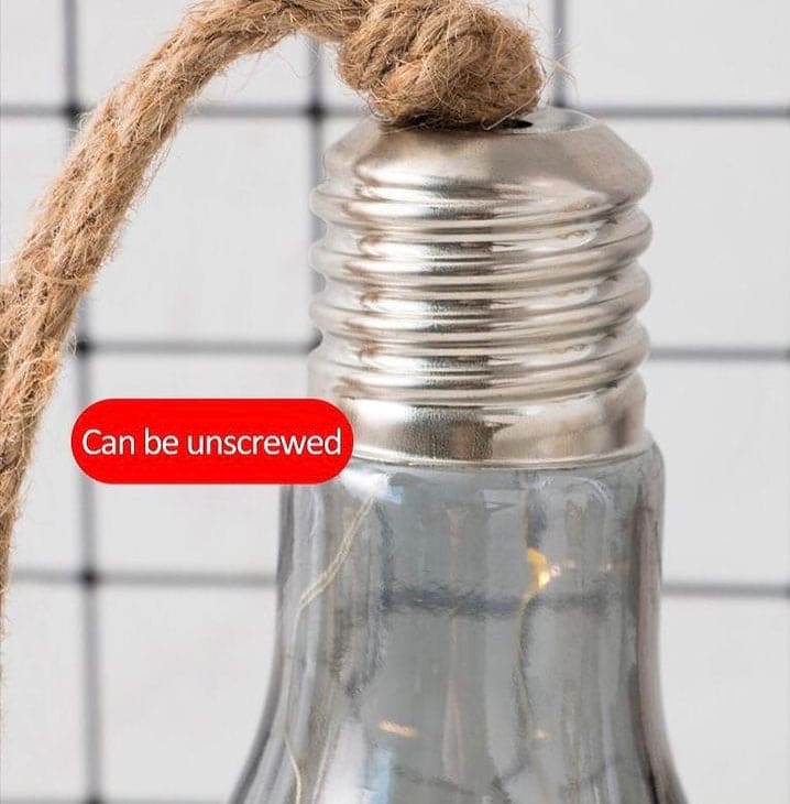 Close-up of creative hemp rope LED bulb screw base with removable feature and rope attached