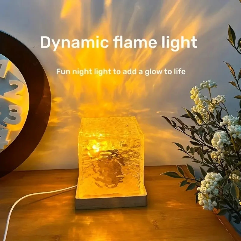Clarify.pk 16 color night lamp with dynamic flame light effect on wooden table near clock and flowers