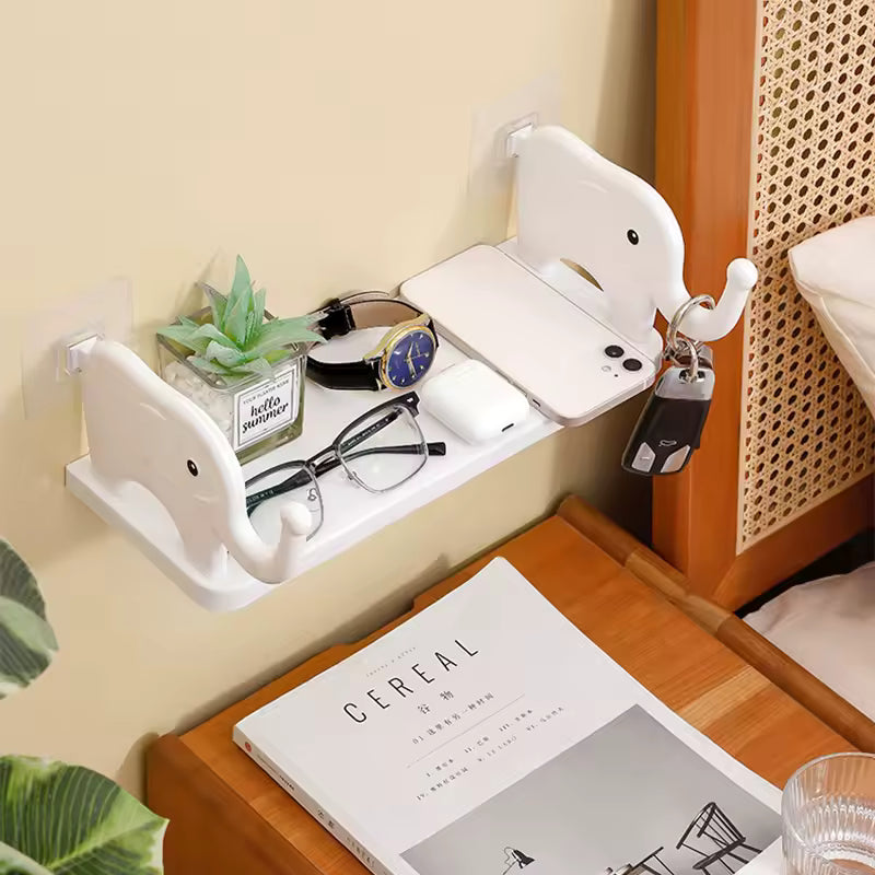 Cute animal design wall organizer mounted with white elephant hooks holding keys and small items