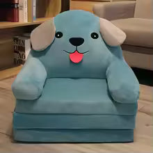Cute cartoon children sofa in the shape of a blue dog with floppy ears and a smiling face