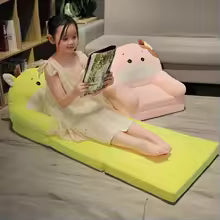 Cute cartoon children sofa with soft pink and yellow cushions in a modern living room