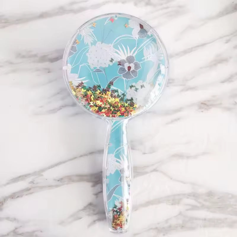 Clarify.pk cute children hair brush with floral design and star-shaped glitter inside handle