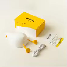 Clarify.pk cute duck night light with USB charging cable and user manual on white background