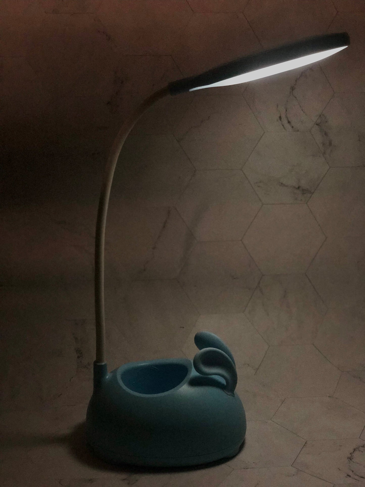 Cute rabbit desk lamp with flexible neck and soft blue base designed like a rabbit