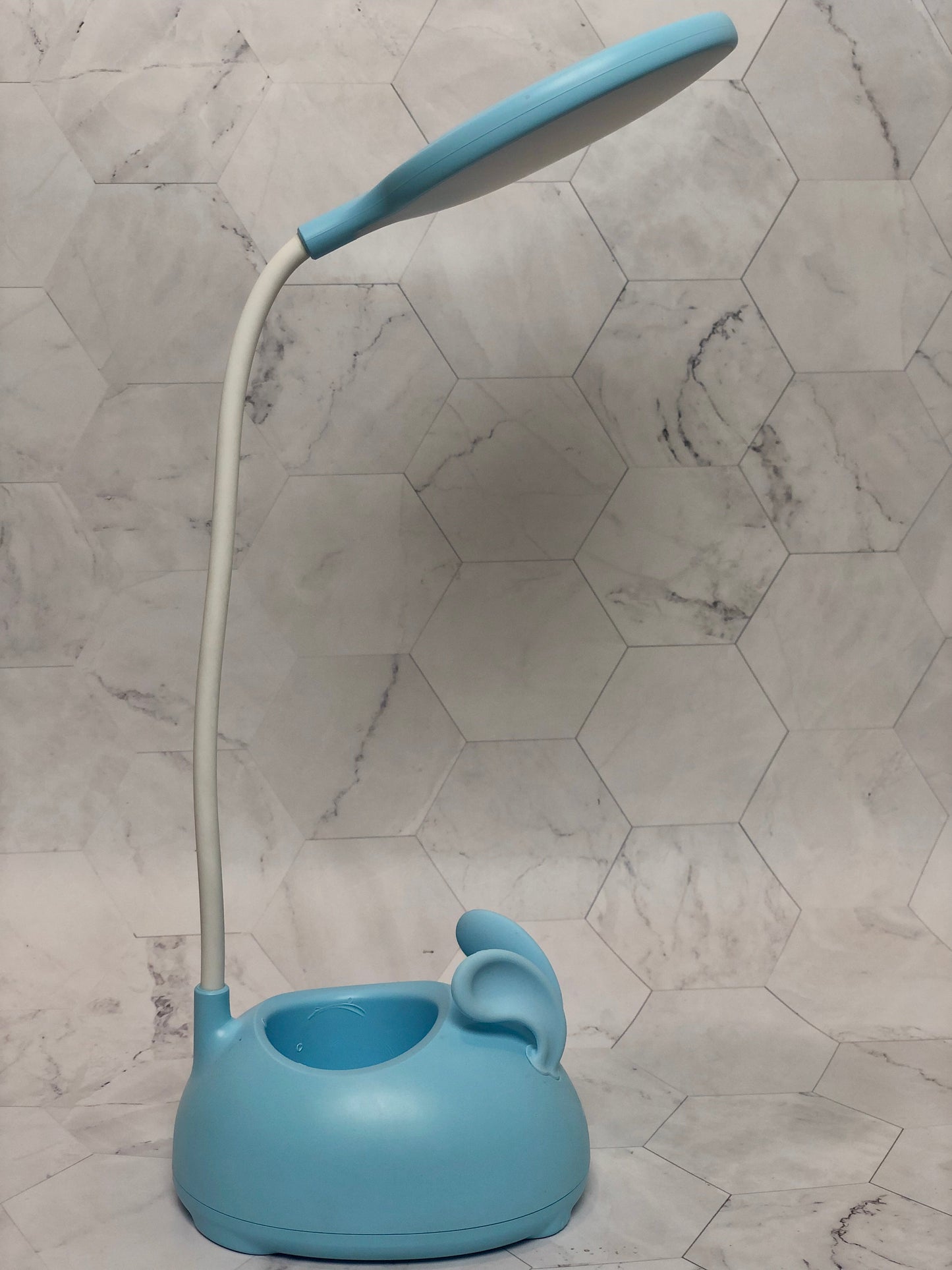 Cute rabbit desk lamp in blue with flexible white neck and rabbit ear design on the base
