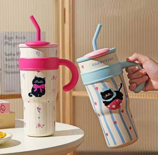 Cute stainless steel tumbler with straw featuring colorful cat designs and comfortable handles