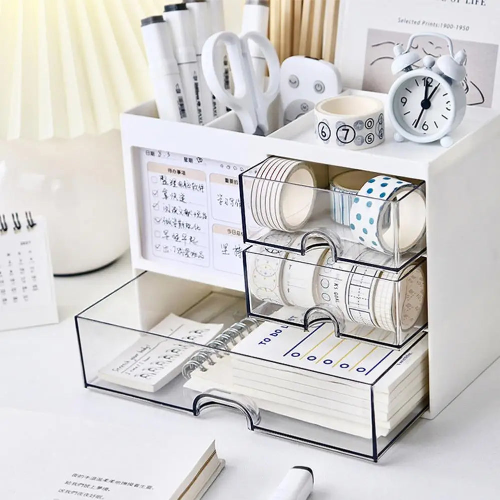 Clarify.pk white desktop organizer with drawers holding stationery, tape rolls, scissors, and an alarm clock