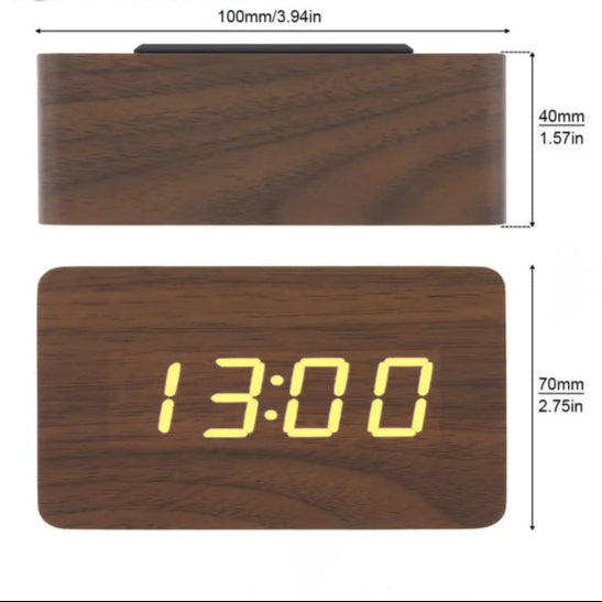 Digital wooden alarm clock with yellow LED display showing 13 00 and compact rectangular design