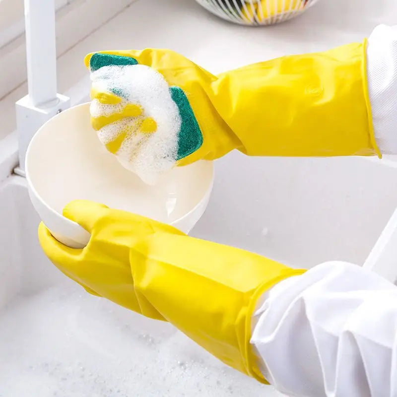 Clarify.pk yellow dishwashing gloves with sponge cleaning a white bowl with soap foam