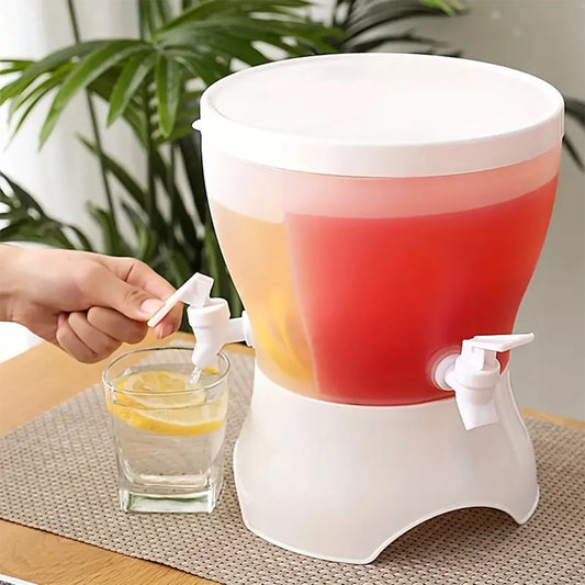 Clarify.pk divider design beverage container with two spouts dispensing different drinks into a glass