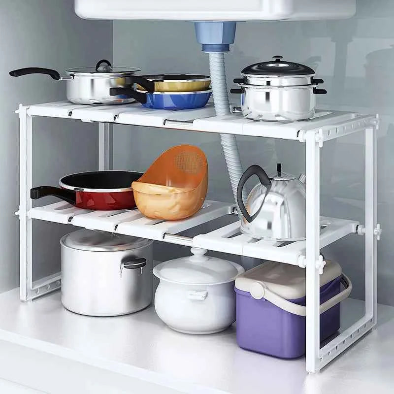 Double layer dish holder with pots and pans organized on two shelves for efficient kitchen storage