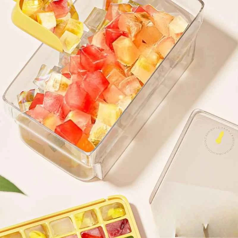 Double layer ice cube mold filled with colorful ice cubes for making refreshing drinks